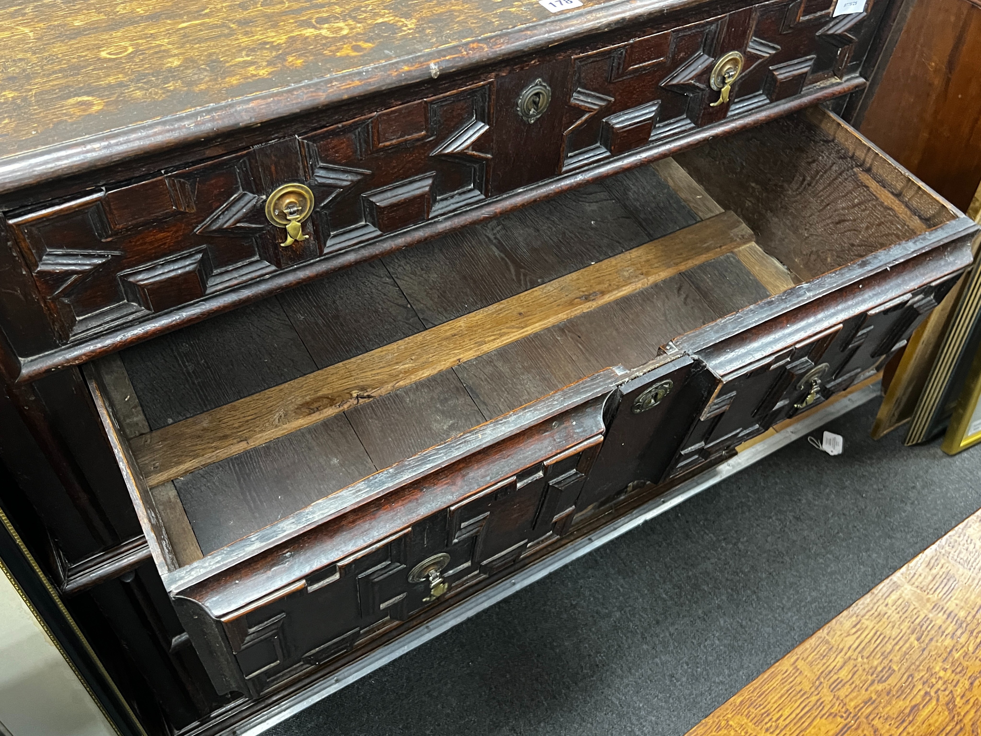 A 17th century oak chest of drawers, length 111cm, depth 58cm, height 103cm